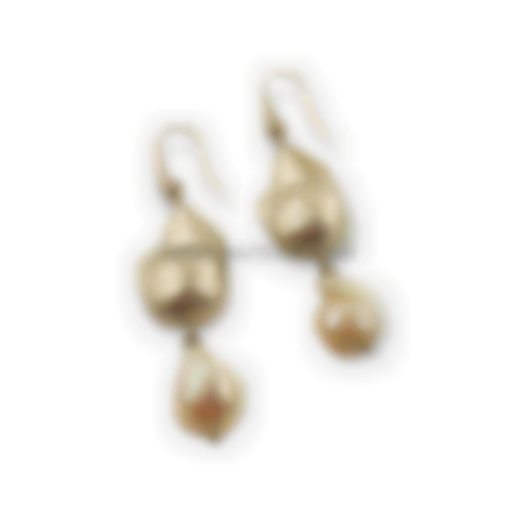 Earrings set in white silver with baroque pearls