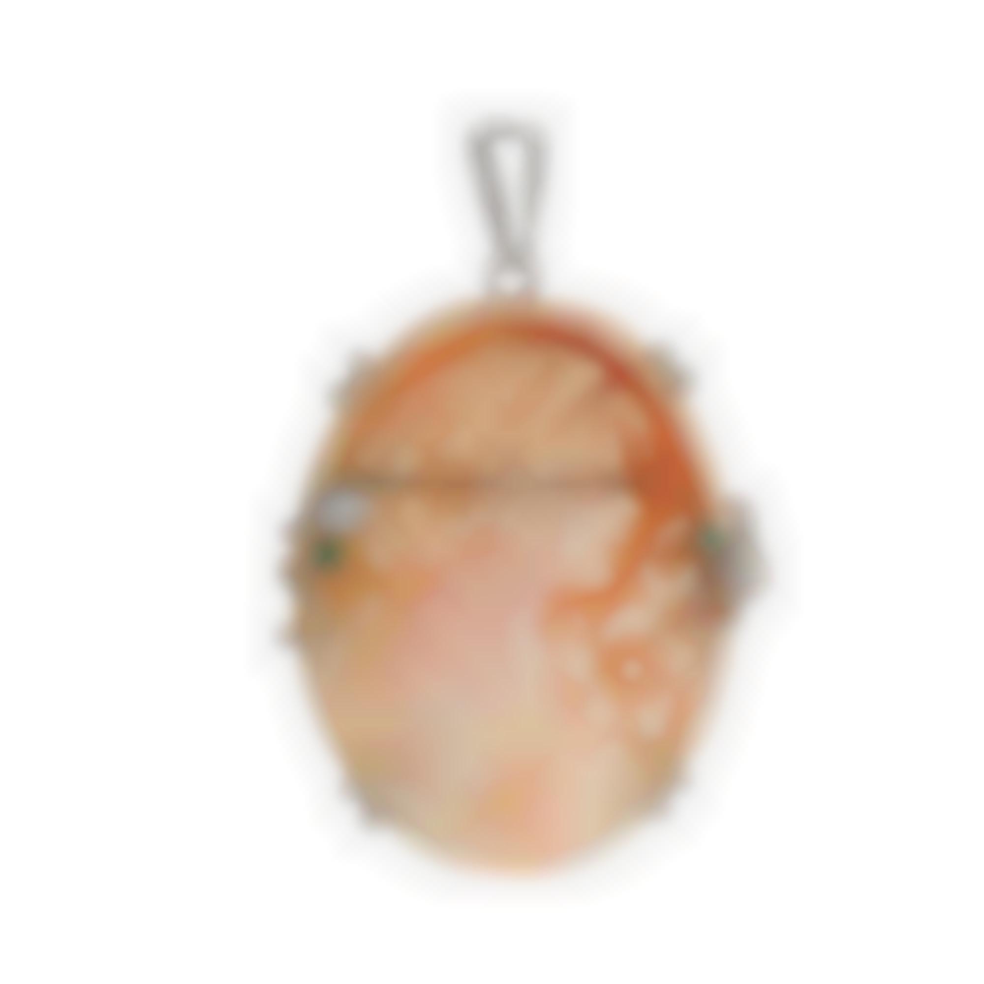 Green zirconia with natural seashell cameo set in silver