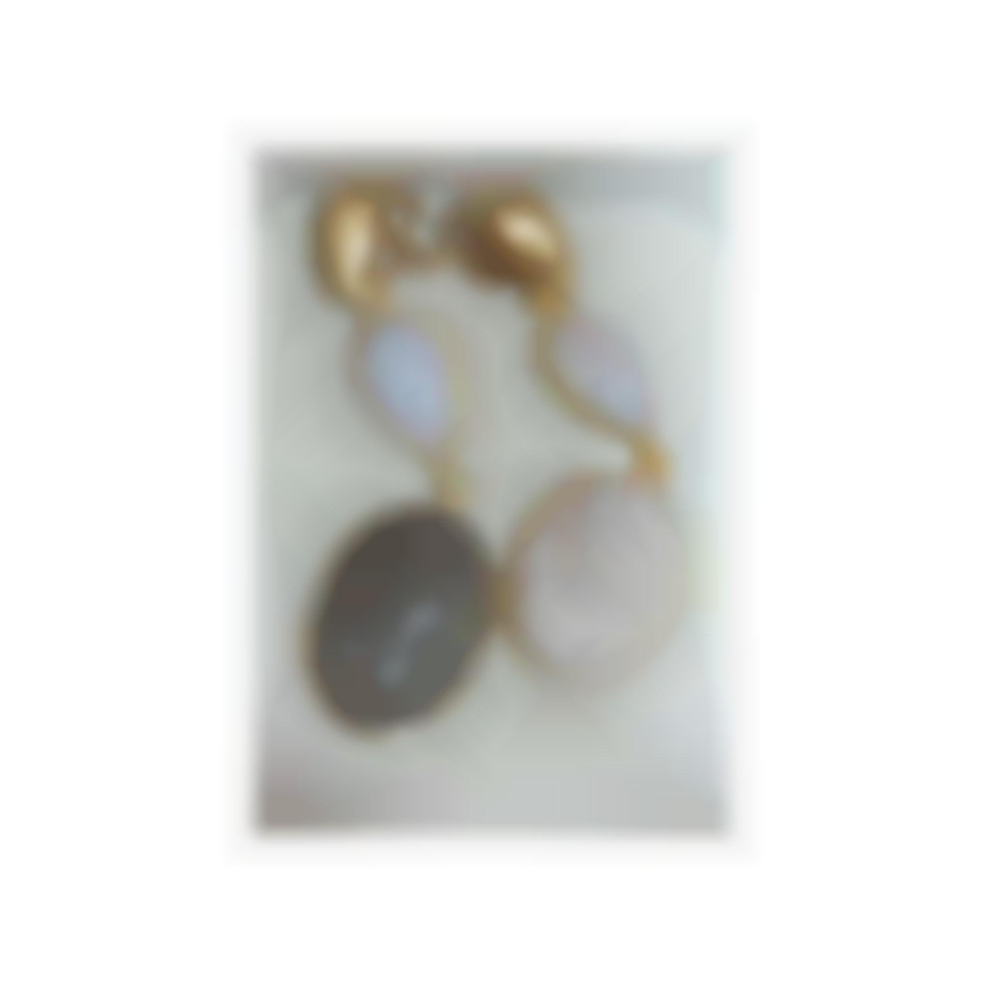 Earrings with moon stones cameos set in silver