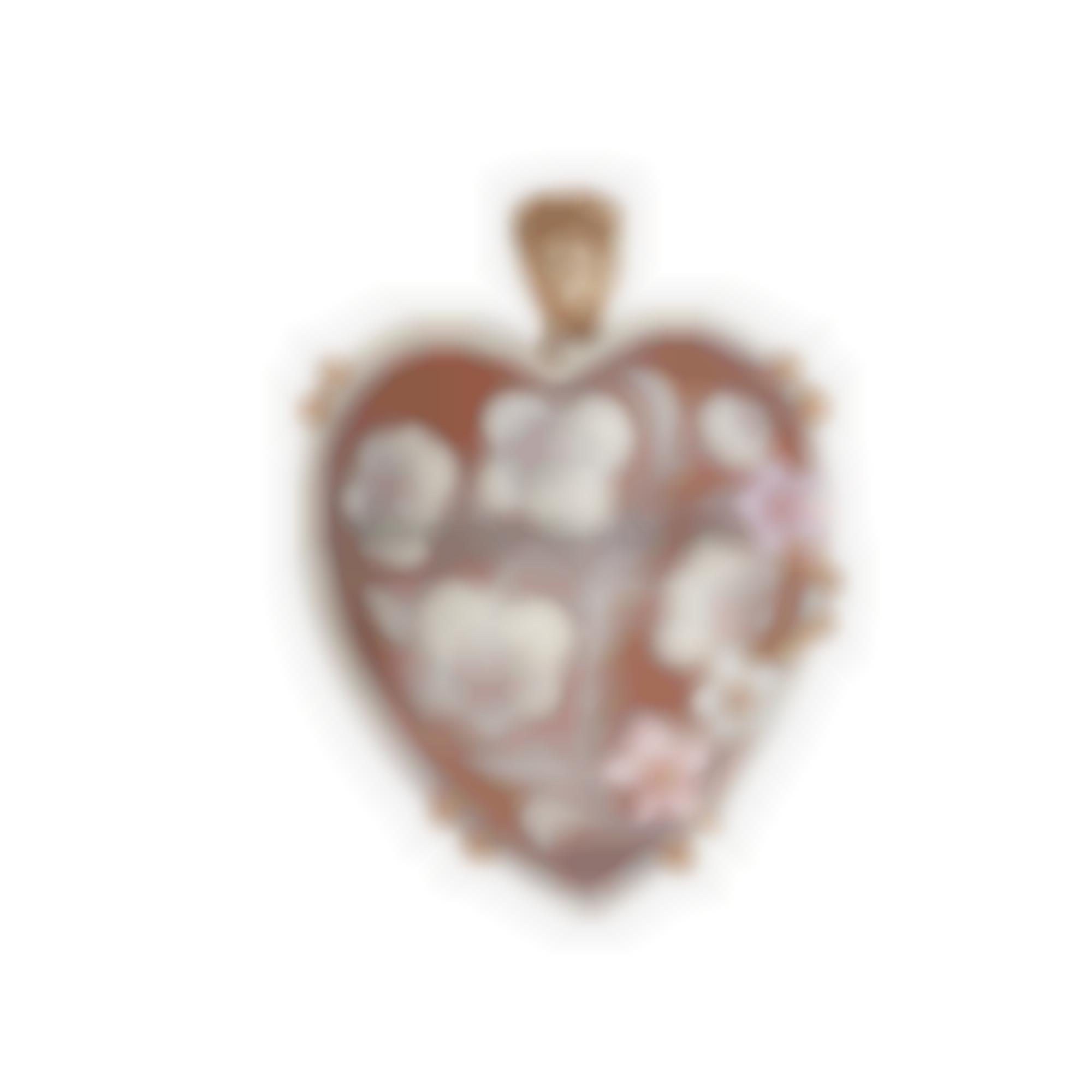 Pendant set in silver with natural cameo heart shape