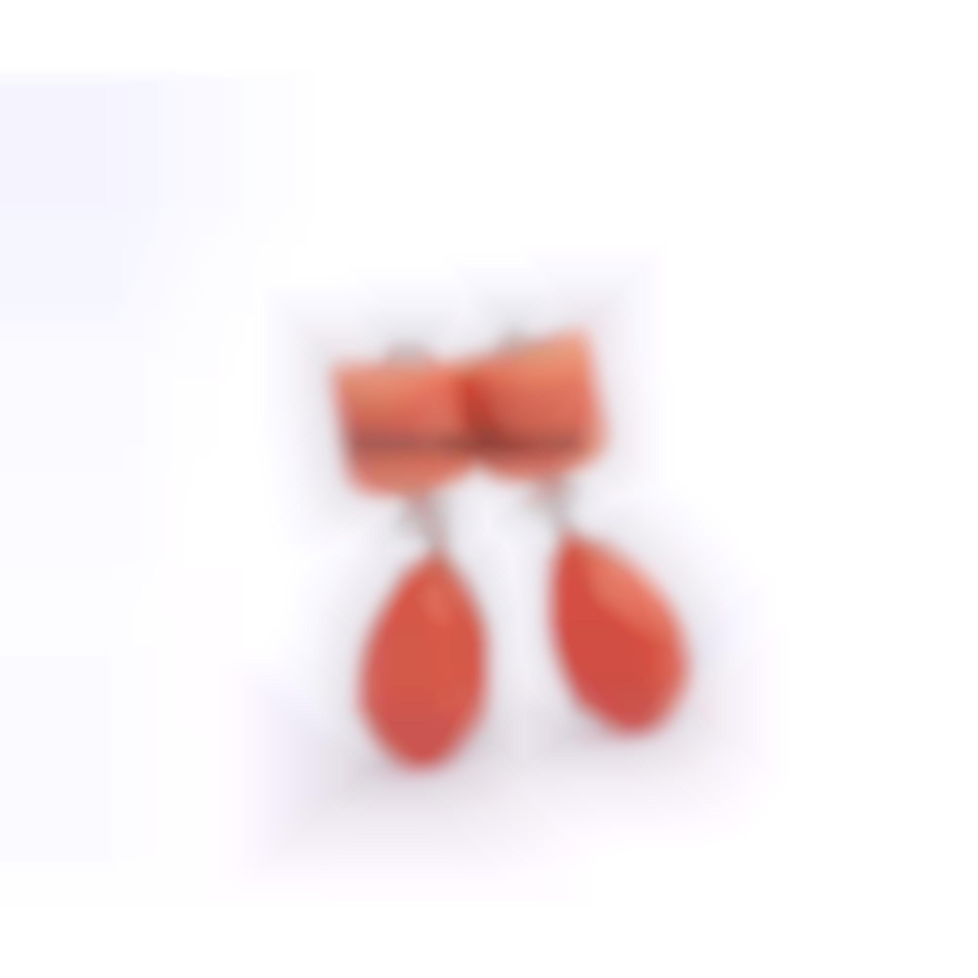 Earrings set in gold with diamonds and coral 