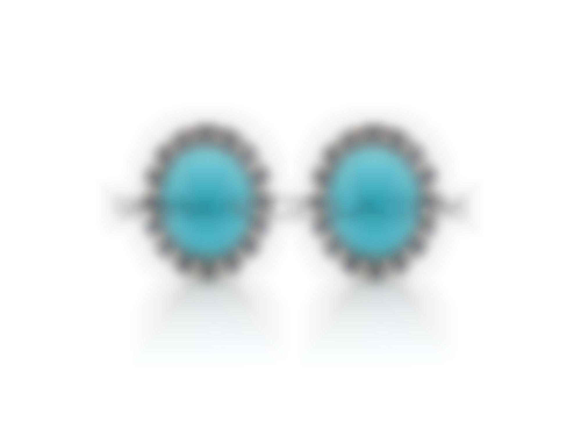Earrings set in gold with turquoise cabochon 