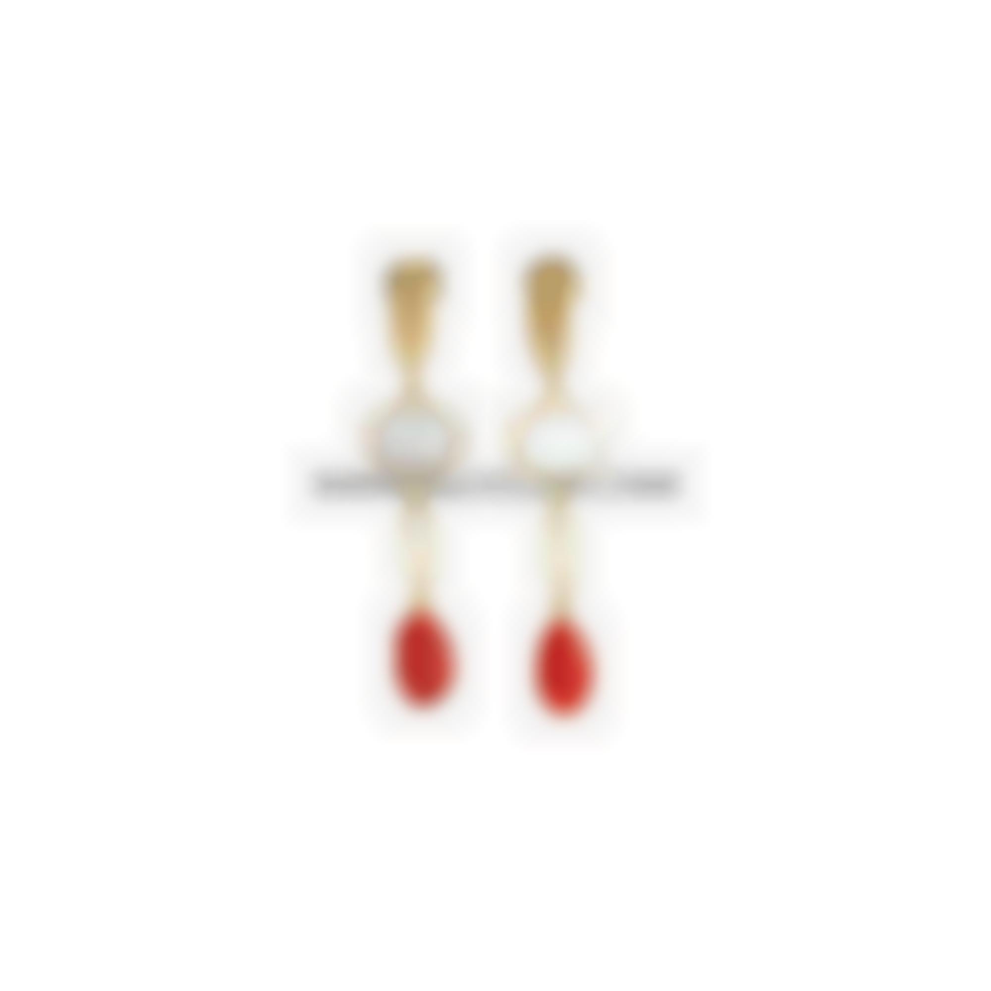 Earrings set in silver with baroque coral cabochon