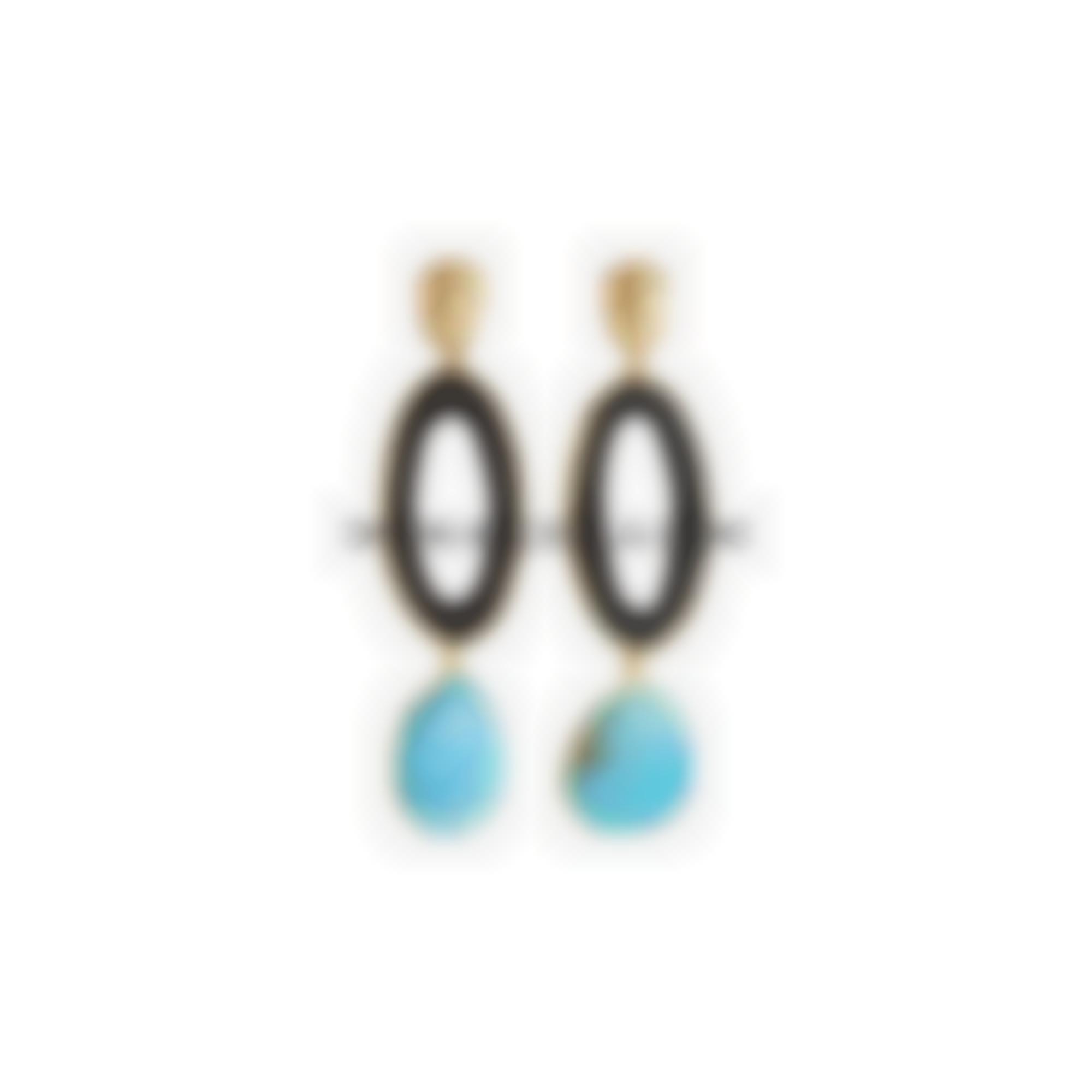 Turchese naturale ebano montati in argento giallo