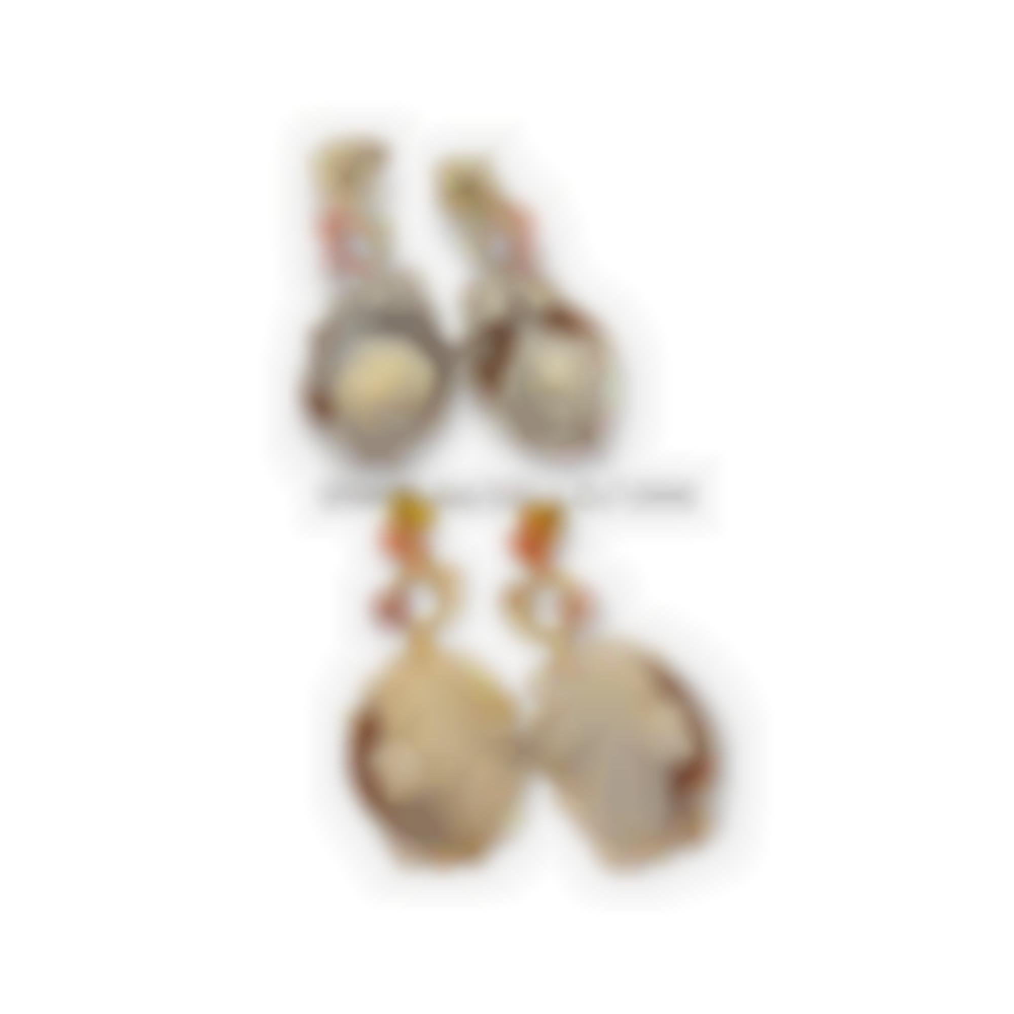 Cameos set in silver with mop flowers