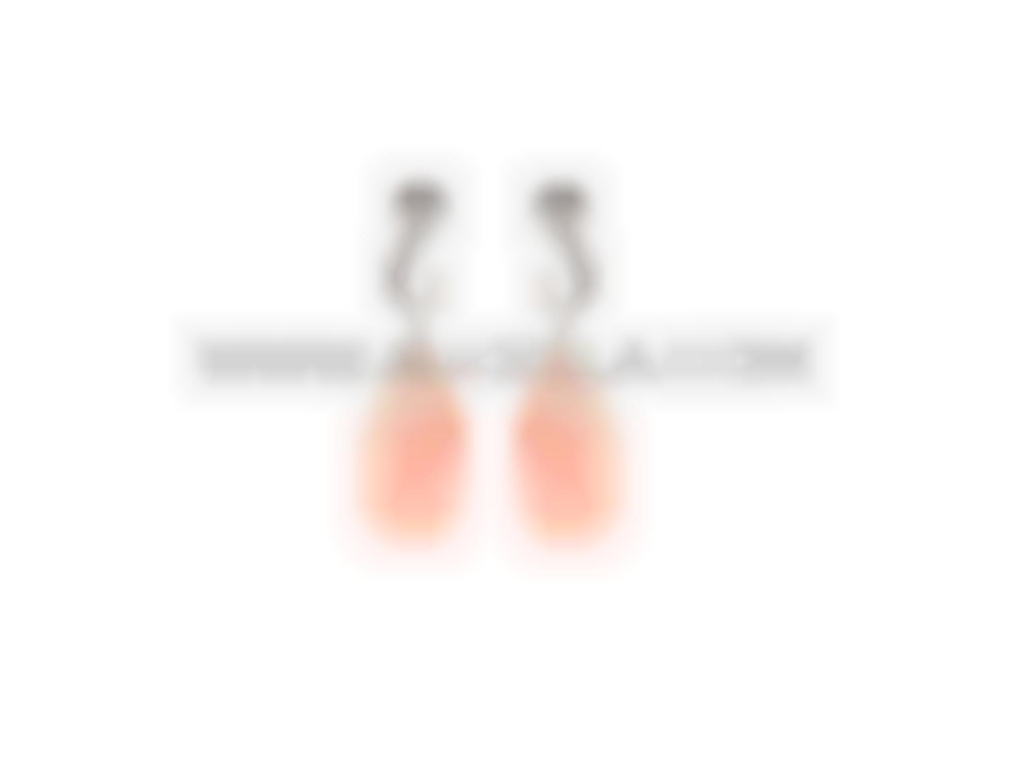 Carved drops set in gold 