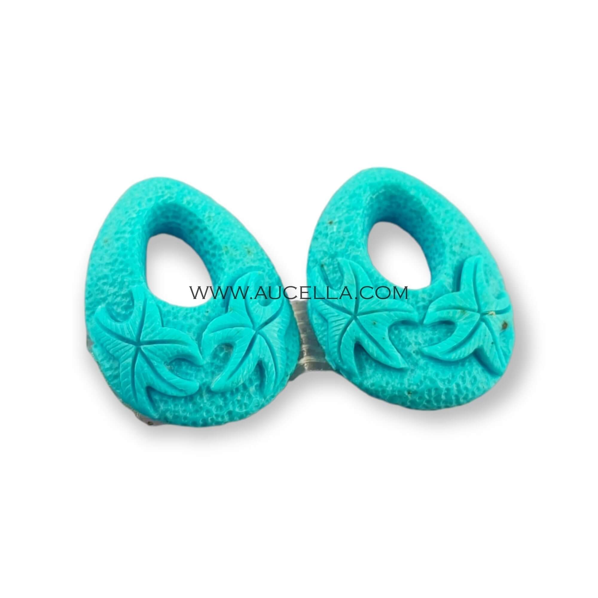 Spole incise a mano su turchese naturale 