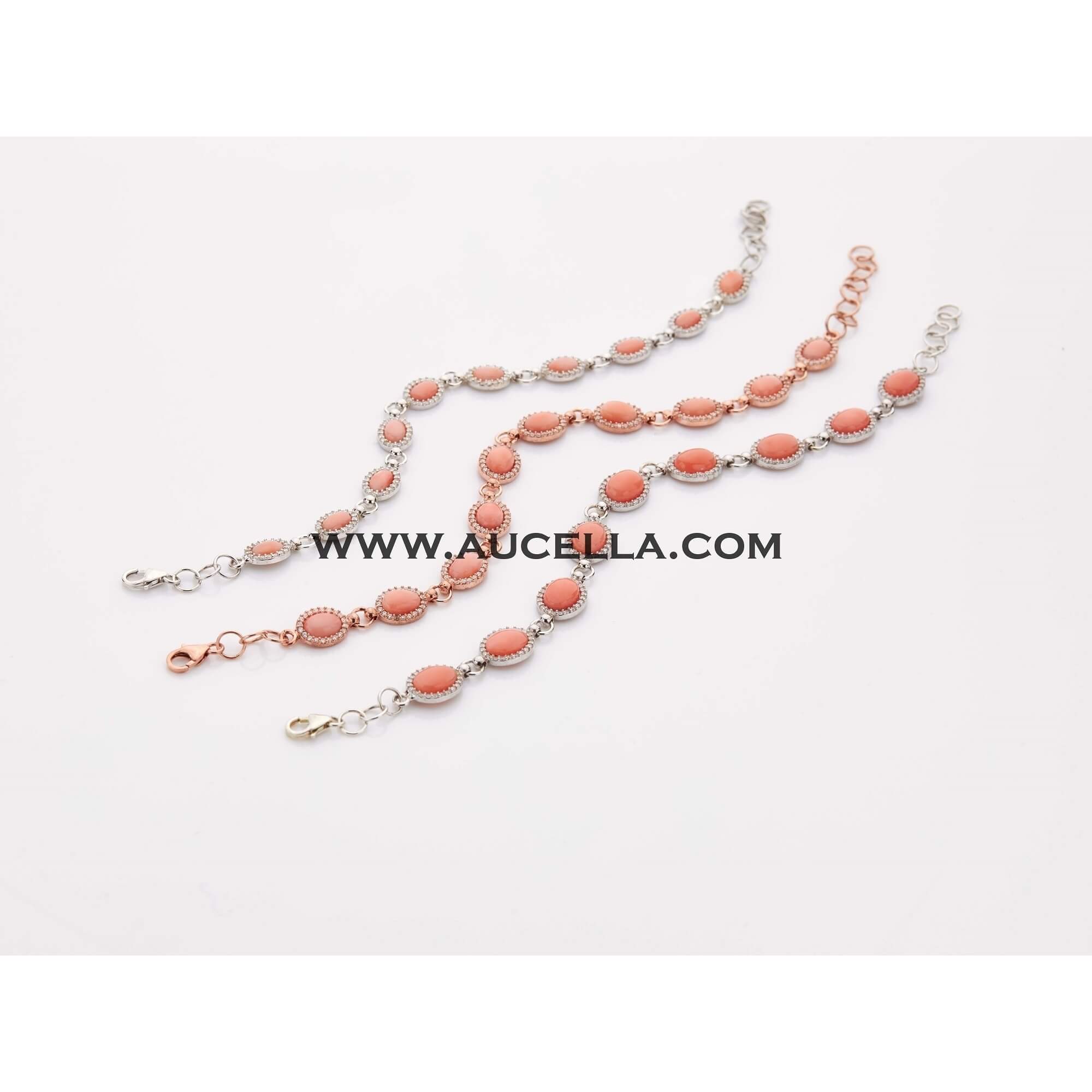 Silver bracelets with 4x6 pink coral cabochones