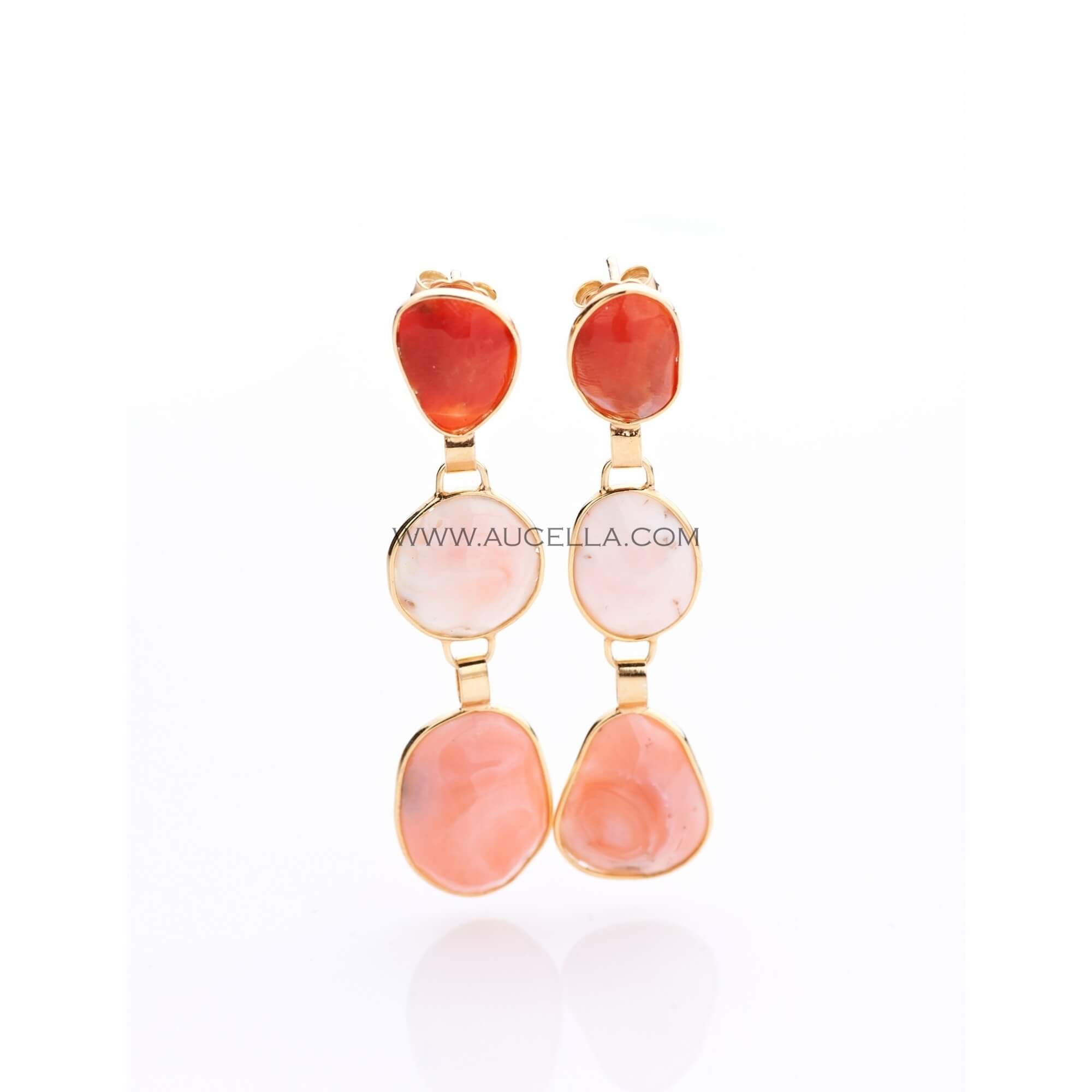 Earrings set in silver with natural coral cabochons 