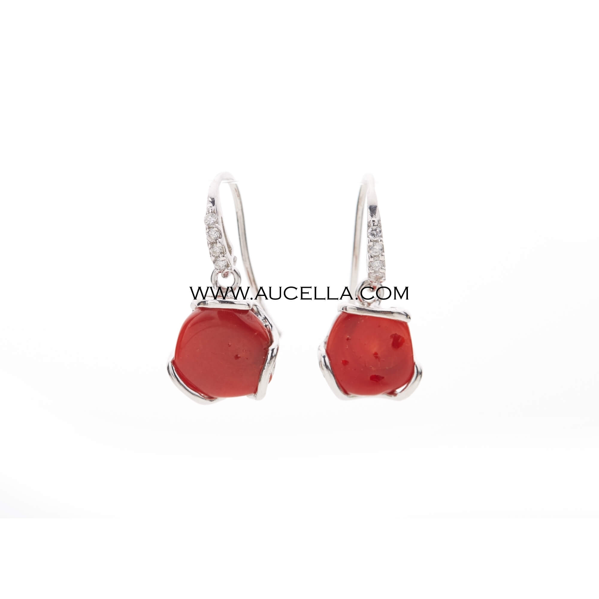 Natural coral cabochon set in silver 