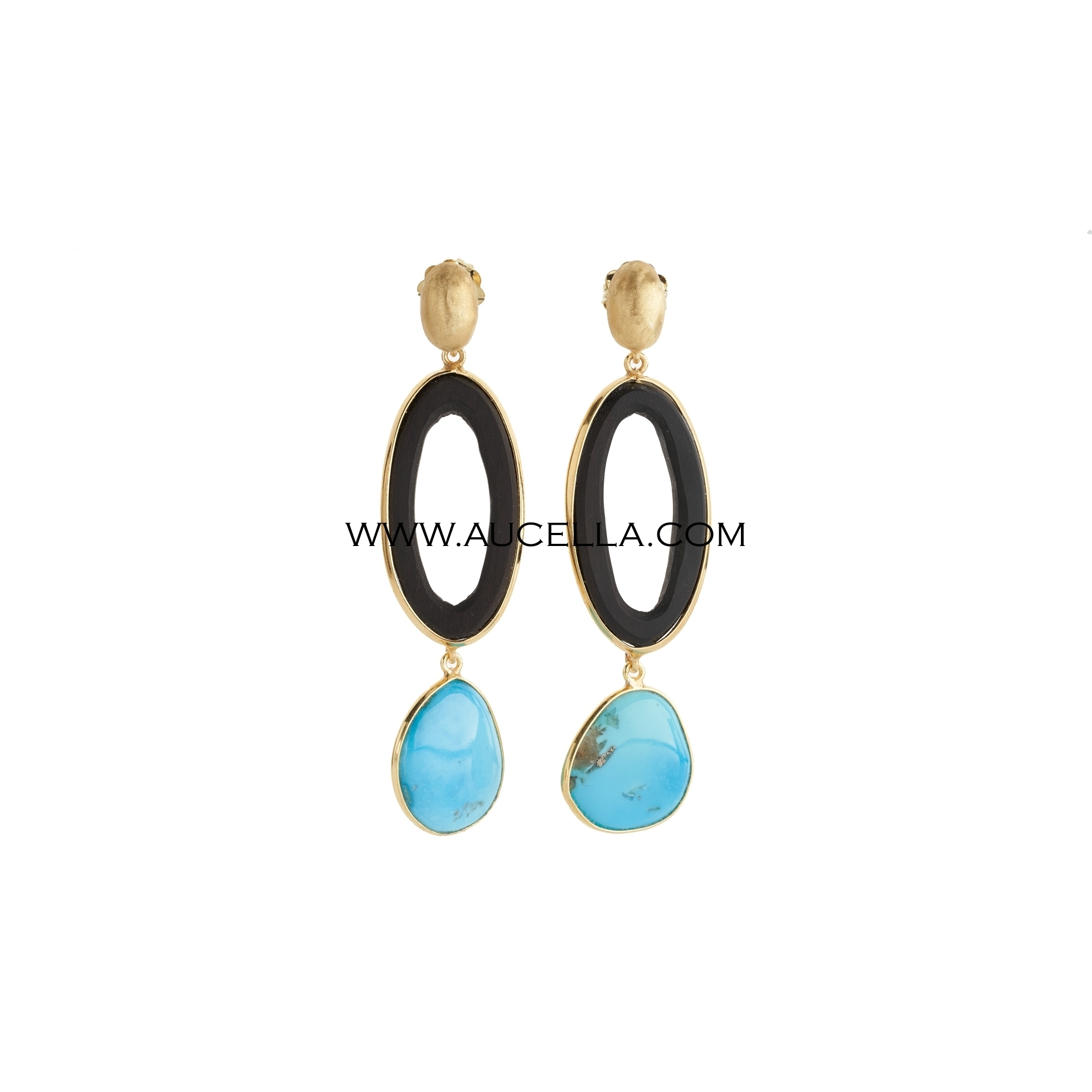 Turchese naturale ebano montati in argento giallo