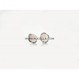 Natural pink coral cabochon set in silver with zircons