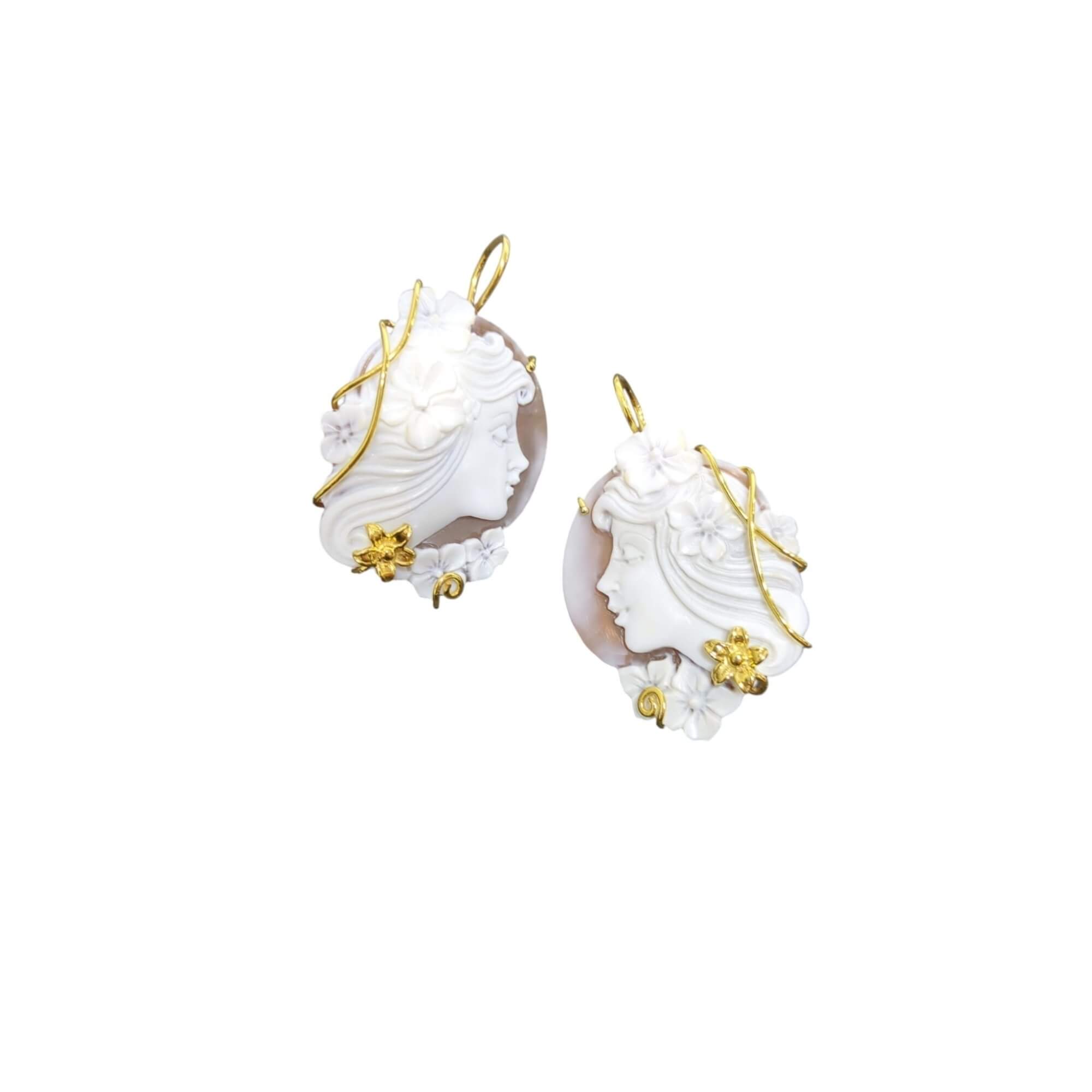 Earrings set in silver with carved seashell cameo