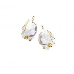 Earrings set in silver with carved seashell cameo