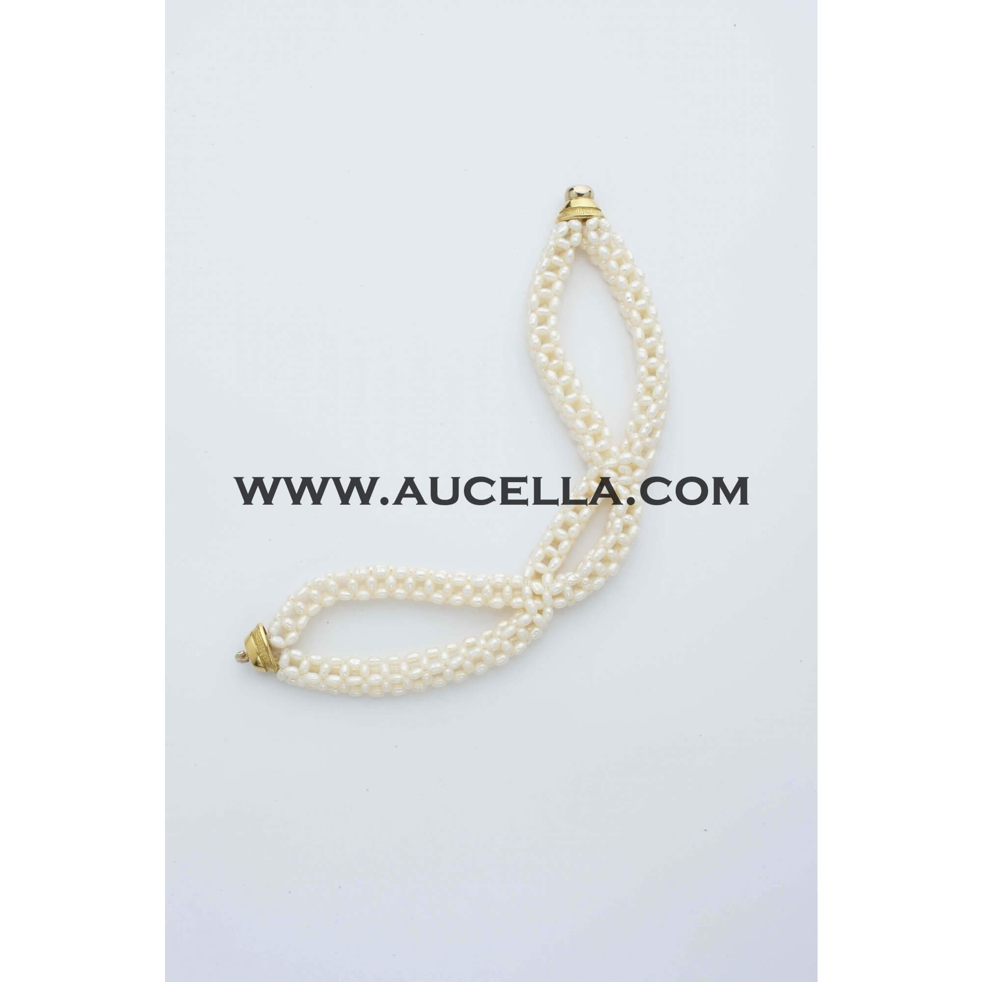 Bracciale in oro con perle lavorazione tessito