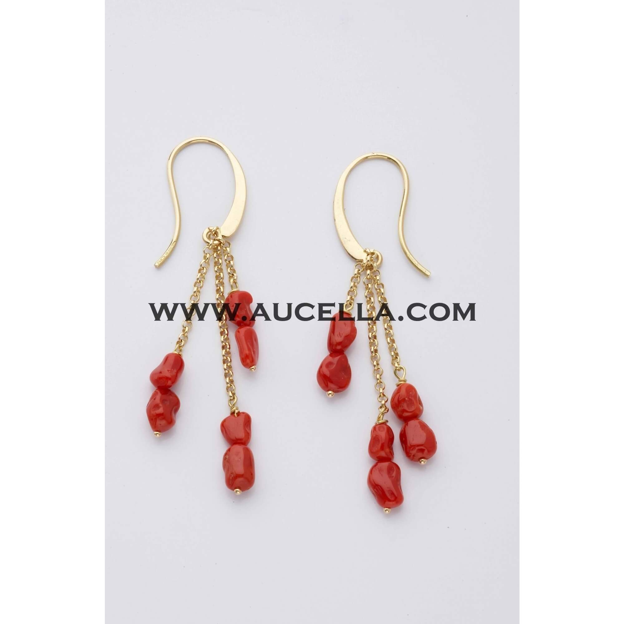 Earrings with small nuggets set in gold 