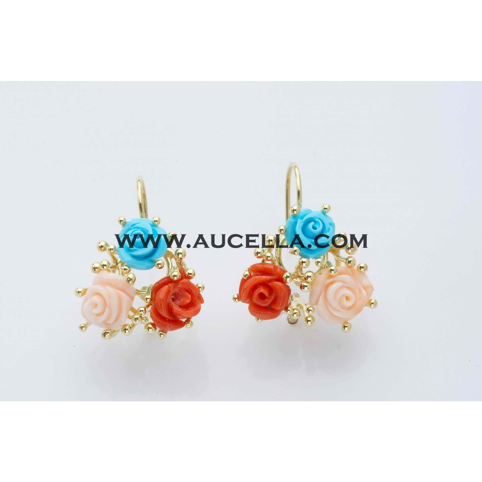 Earrings set in gold with coral and turquoise