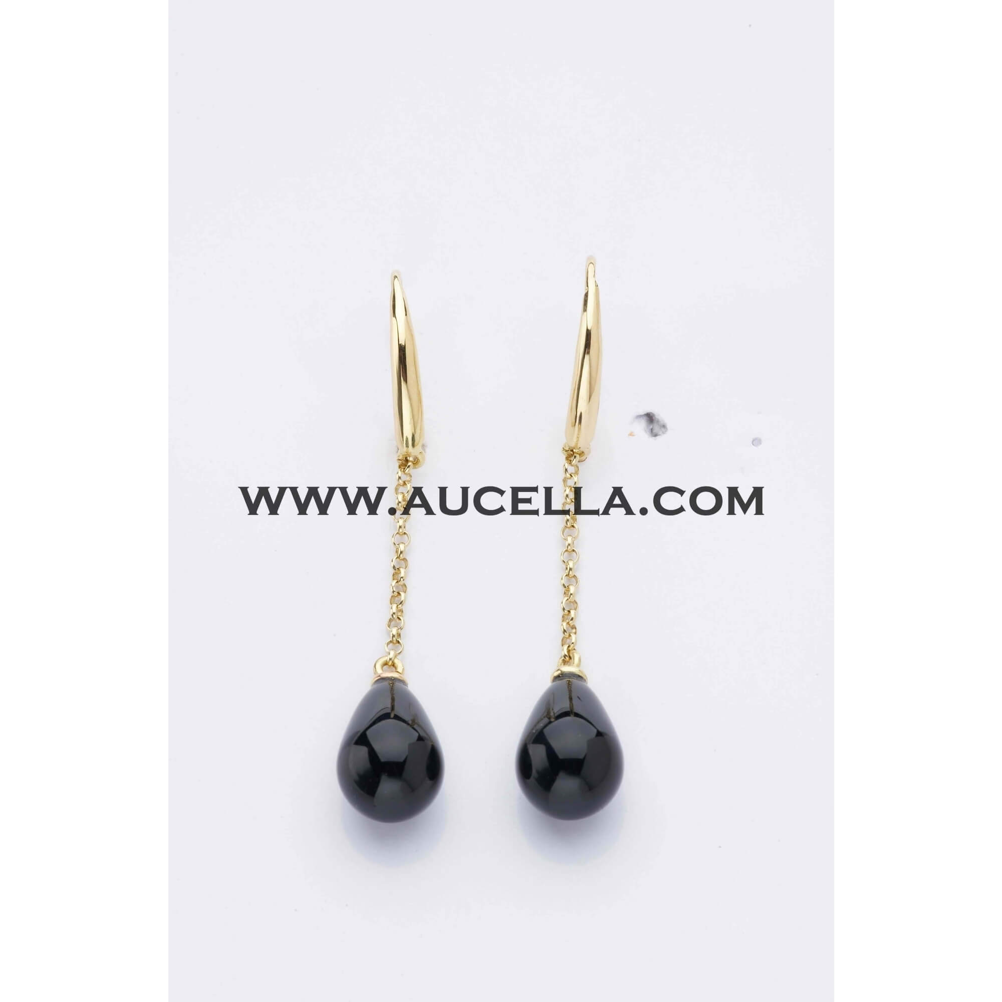 Earrings set in gold with black onyx