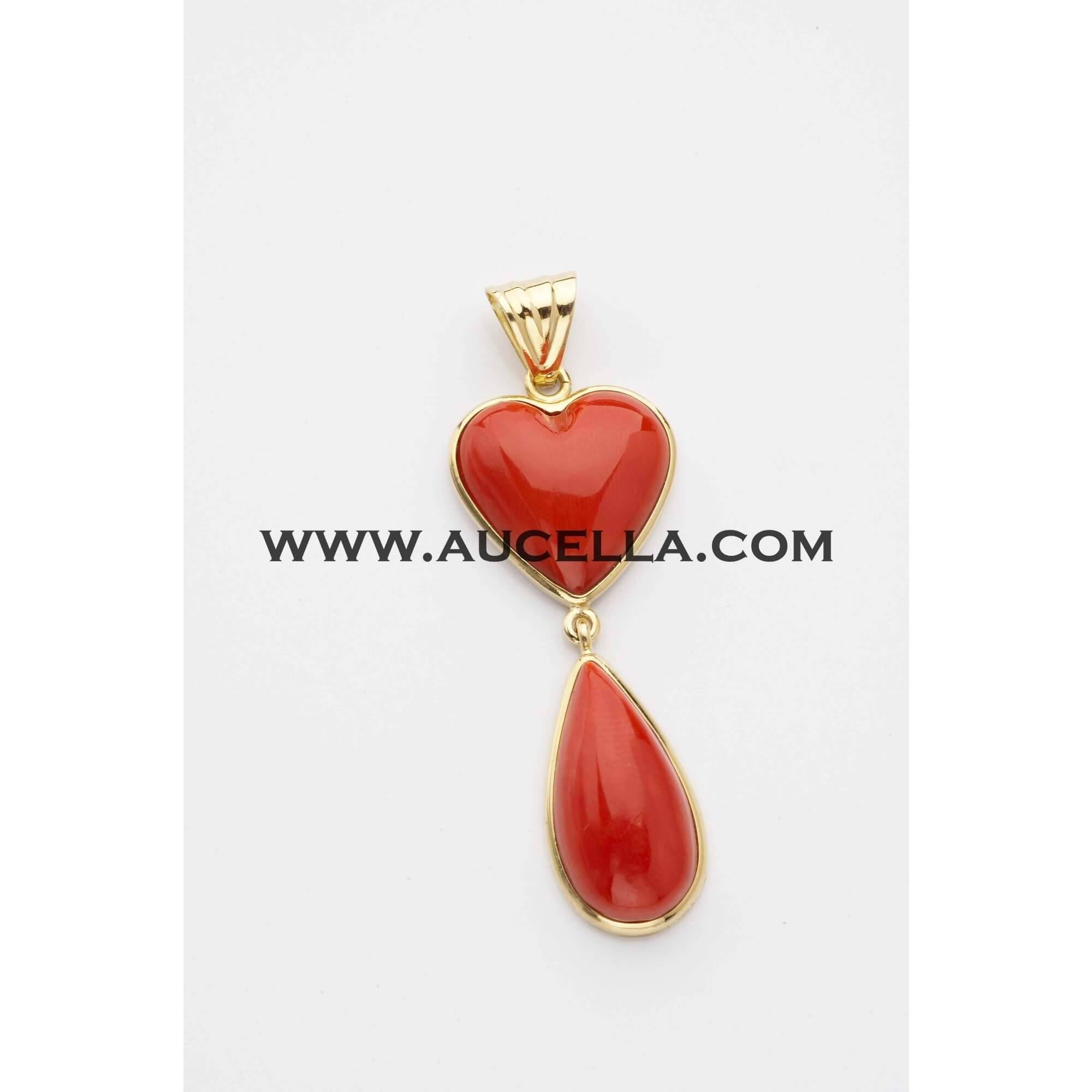 Pendant with heart and drop coral set in gold 
