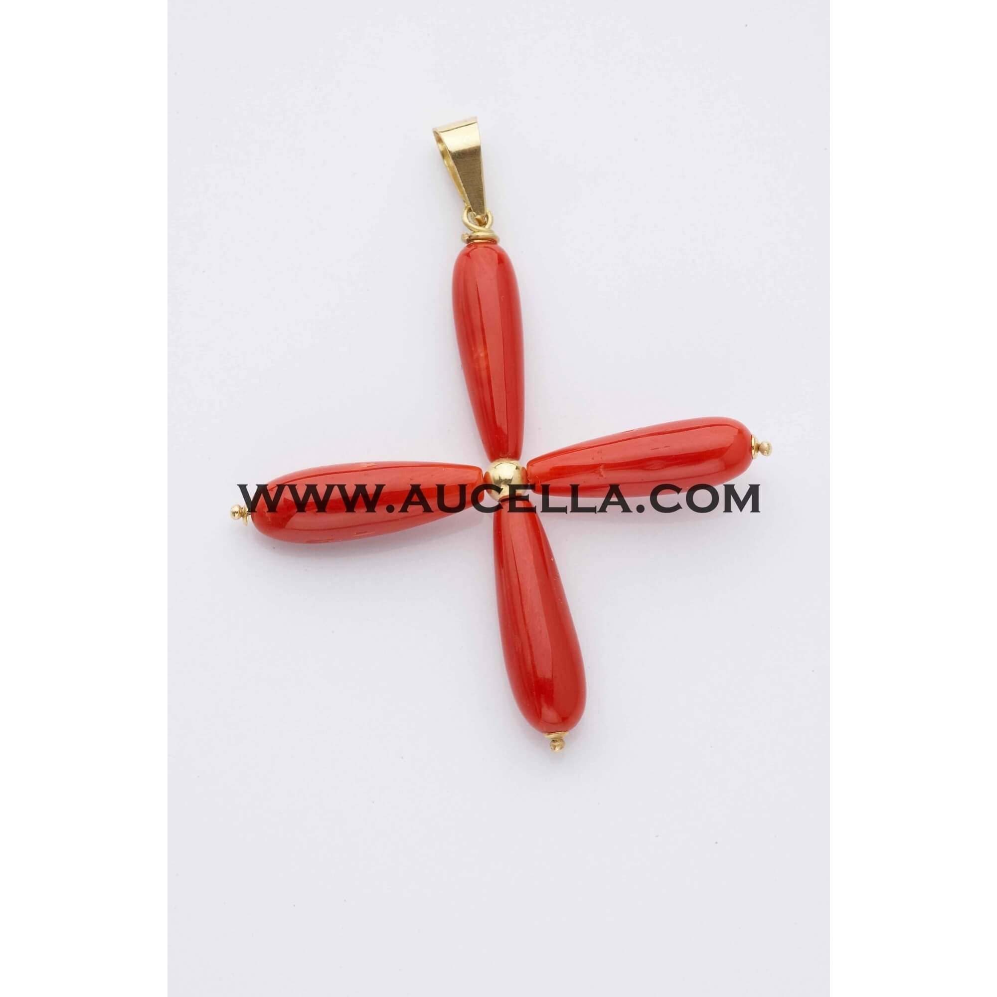 Coral cross set in gold 