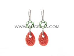 Pink coral carved and set in gold with stones 