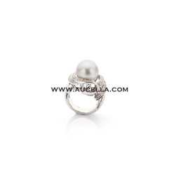 Big ring set in gold with diamonds and pearl 