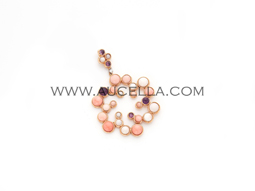 Pendant spiral shape set in gold 