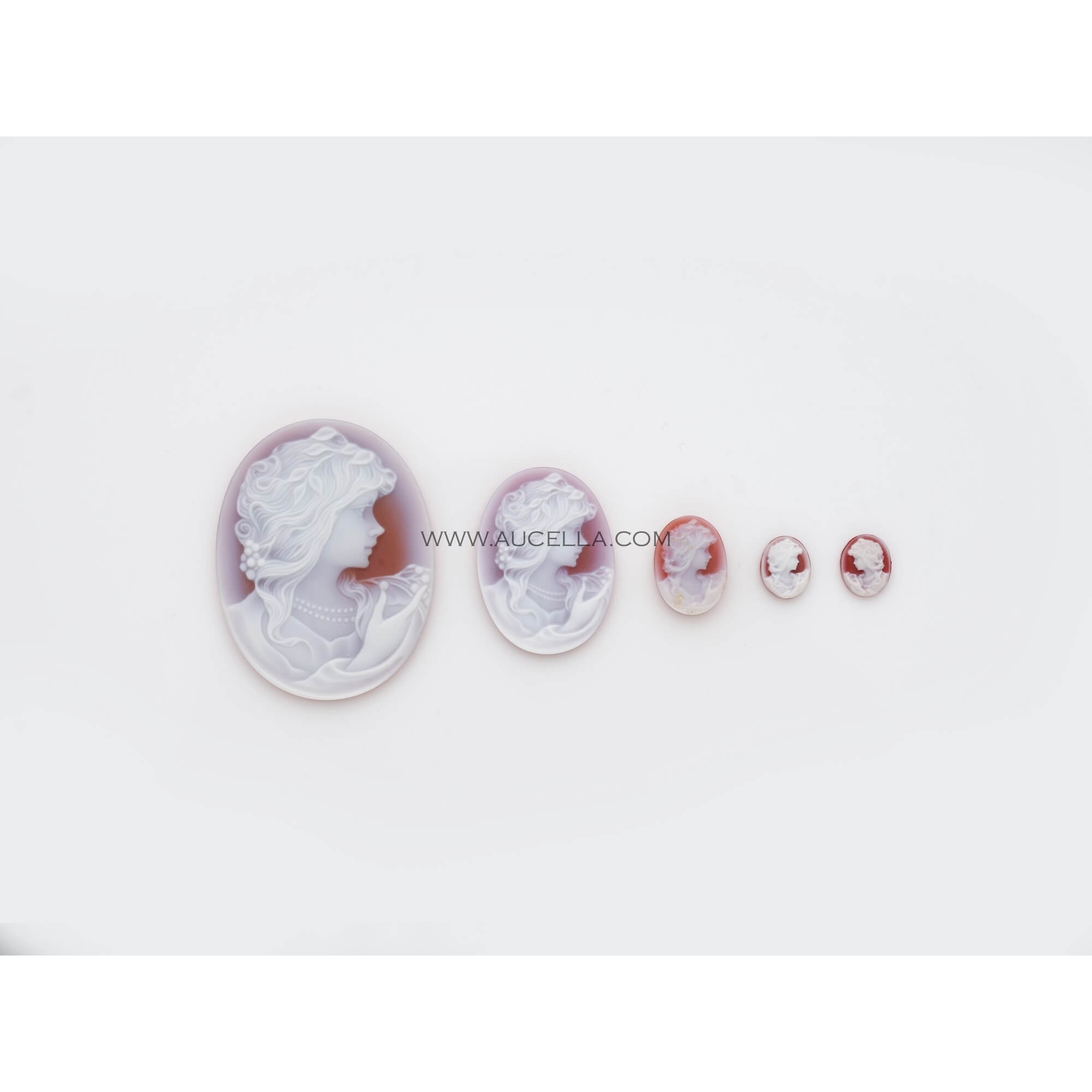 Woman face on red agate cameos