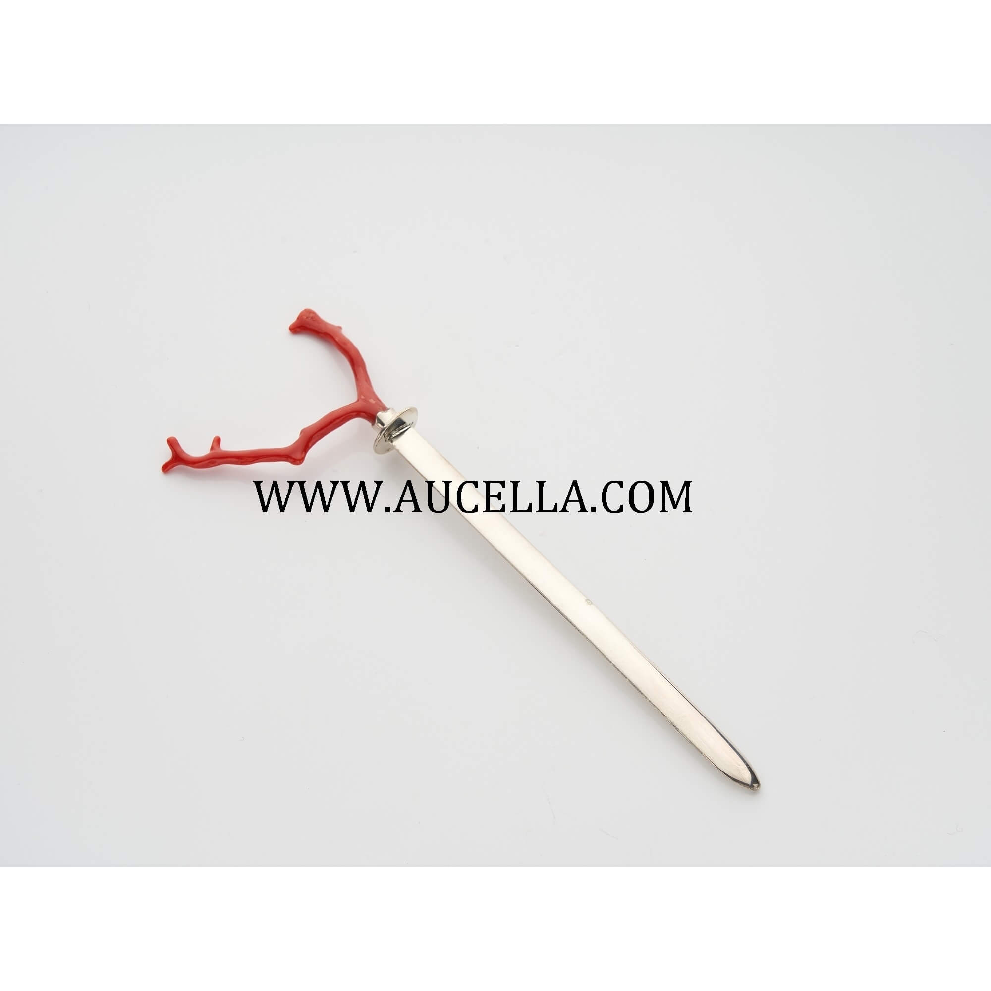 Paperknife set in silver with natural coral